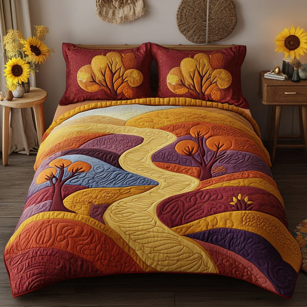 Enchanted Autumn quilted 3-piece bedding set on a made bed with two matching pillow shams