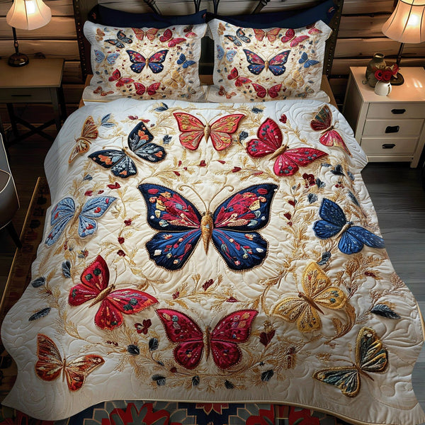 Enchanted Butterfly Bliss quilted 3-piece bedding set on a made bed with two matching pillow shams