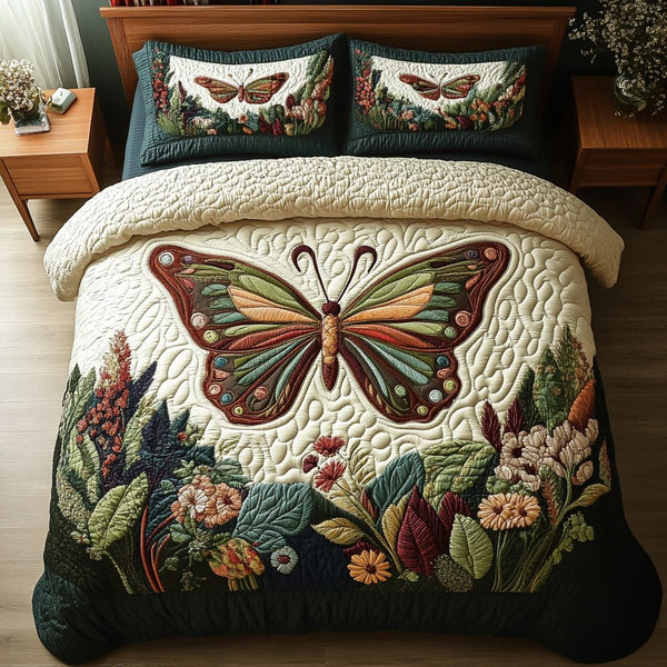 Enchanted Butterfly quilted 3-piece bedding set on a made bed with two matching pillow shams