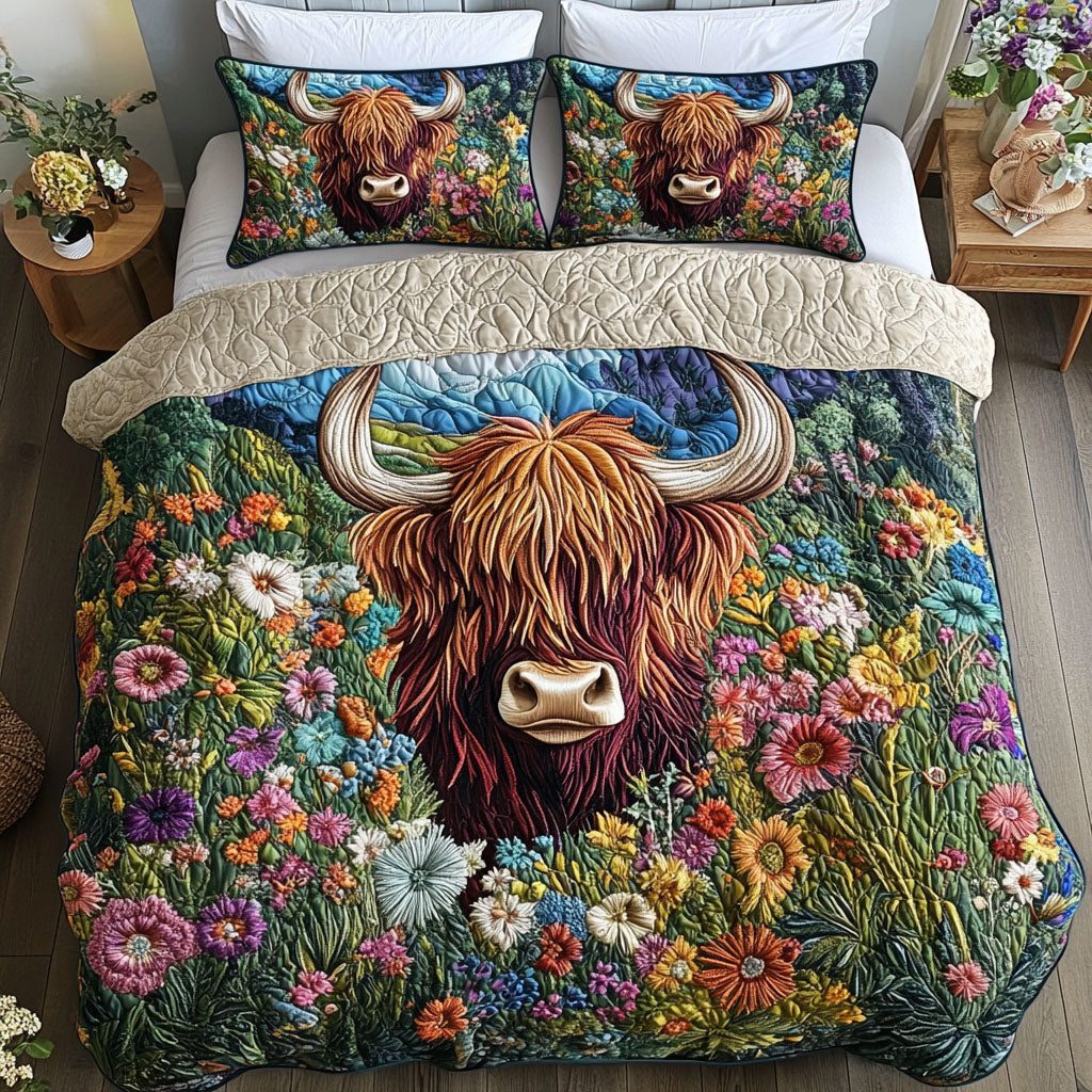 Enchanted Cow Garden quilted 3-piece bedding set on a made bed with two matching pillow shams