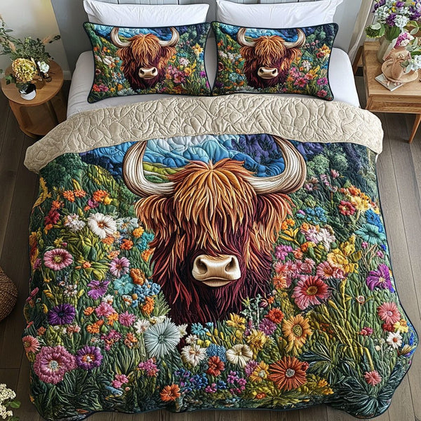Enchanted Cow Garden quilted 3-piece bedding set on a made bed with two matching pillow shams