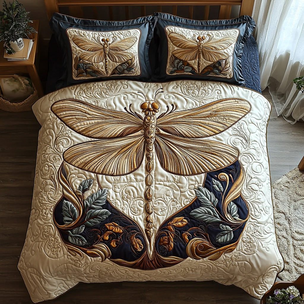 Enchanted Dragonfly quilted 3-piece bedding set on a made bed with two matching pillow shams