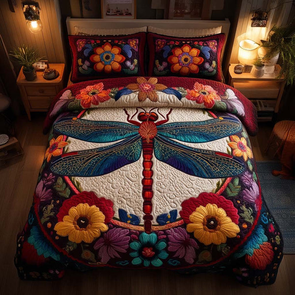 Enchanted Dragonfly quilted 3-piece bedding set on a made bed with two matching pillow shams