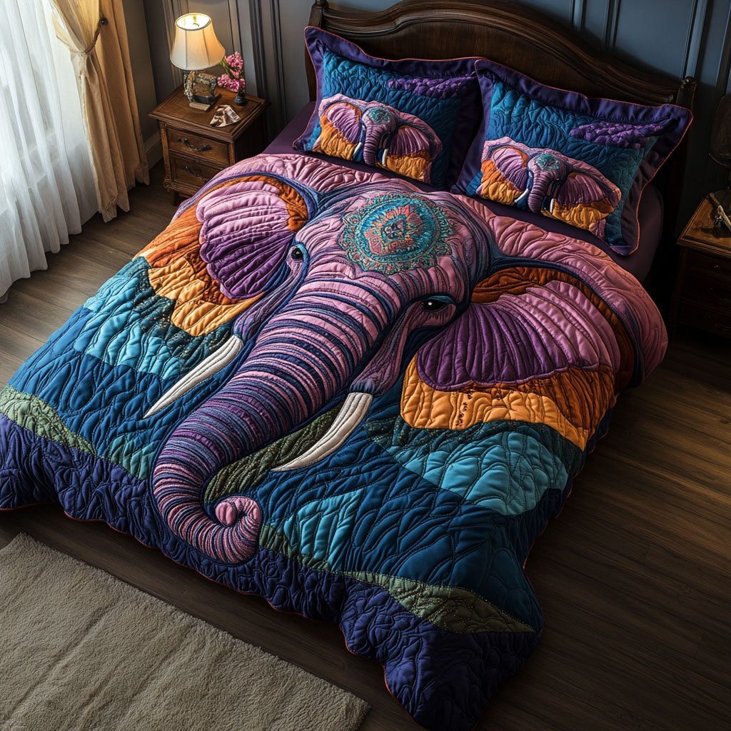 Enchanted Elephant Realm quilted 3-piece bedding set on a made bed with two matching pillow shams