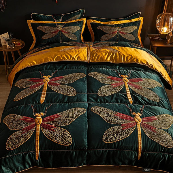 Enchanted Flight quilted 3-piece bedding set on a made bed with two matching pillow shams