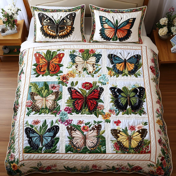 Enchanted Flight quilted 3-piece bedding set on a made bed with two matching pillow shams