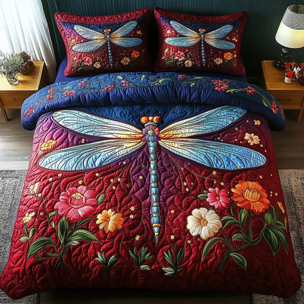 Enchanted Flight quilted 3-piece bedding set on a made bed with two matching pillow shams