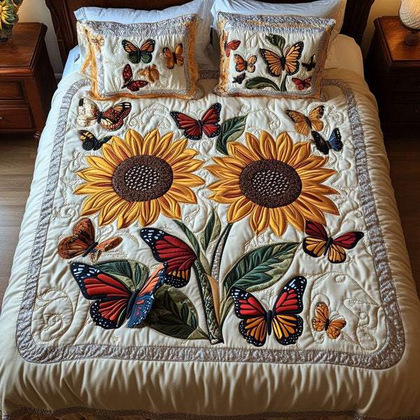 Enchanted Flutter quilted 3-piece bedding set on a made bed with two matching pillow shams