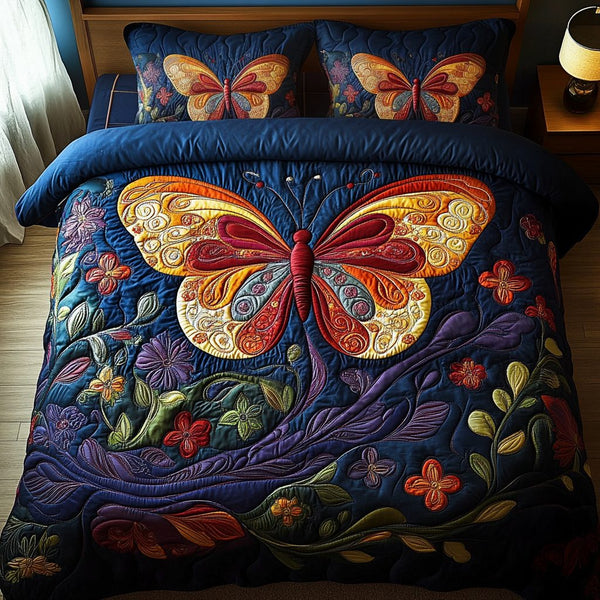Enchanted Flutter quilted 3-piece bedding set on a made bed with two matching pillow shams
