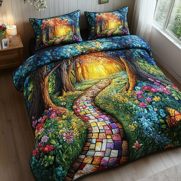 Enchanted Forest Path quilted 3-piece bedding set on a made bed with two matching pillow shams