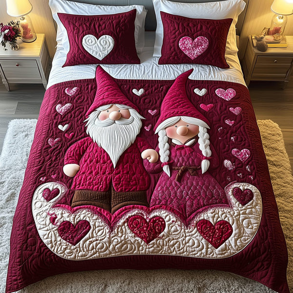 Enchanted Hearts quilted 3-piece bedding set on a made bed with two matching pillow shams