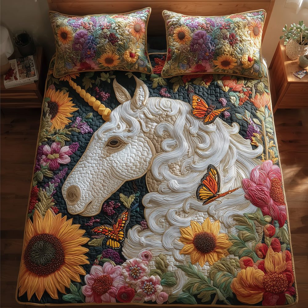 Enchanted Meadow Unicorn quilted 3-piece bedding set on a made bed with two matching pillow shams
