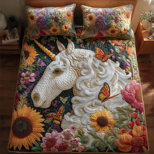 Enchanted Meadow Unicorn quilted 3-piece bedding set on a made bed with two matching pillow shams