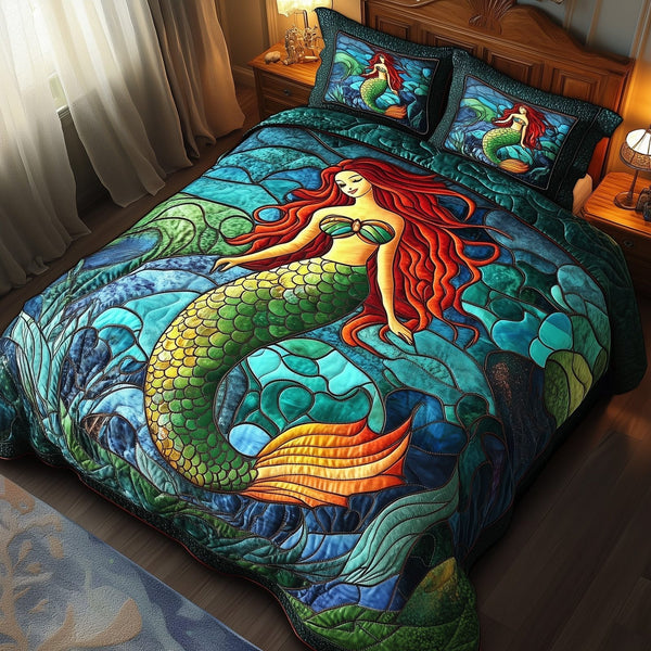 Enchanted Mermaid quilted 3-piece bedding set on a made bed in a light coastal bedroom