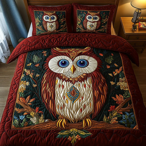 Enchanted Owl quilted 3-piece bedding set on a made bed with two matching pillow shams