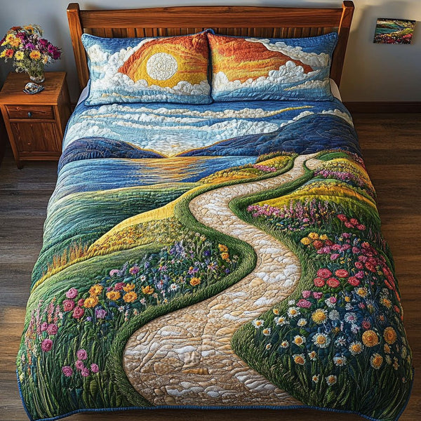 Enchanted Valley quilted 3-piece bedding set on a made bed with two matching pillow shams