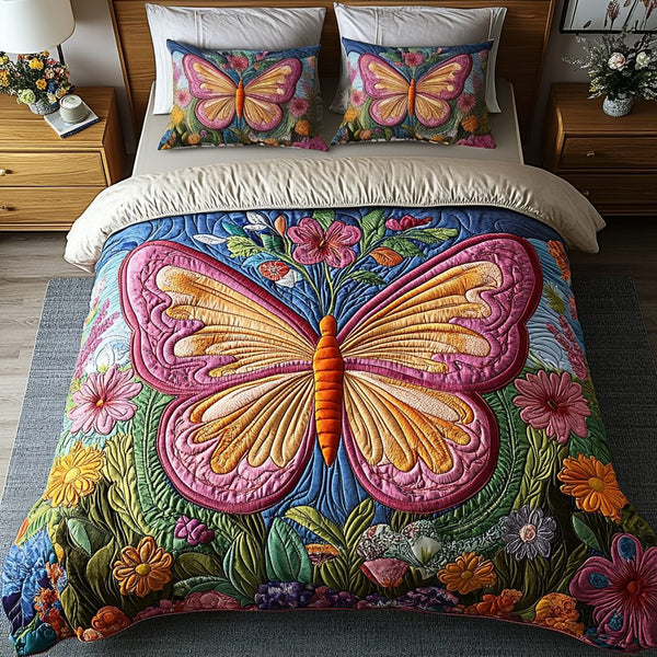 Enchanted Wings quilted 3-piece bedding set on a made bed with two matching pillow shams