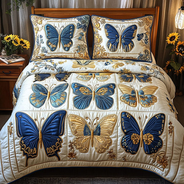 Enchanting Garden quilted 3-piece bedding set on a made bed with two matching pillow shams