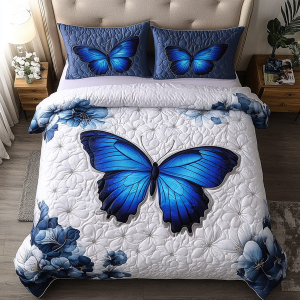 Eternal Butterfly quilted 3-piece bedding set on a made bed with two matching pillow shams