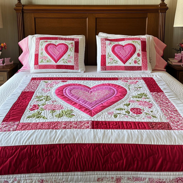 Eternal Love quilted 3-piece bedding set on a made bed with two matching pillow shams