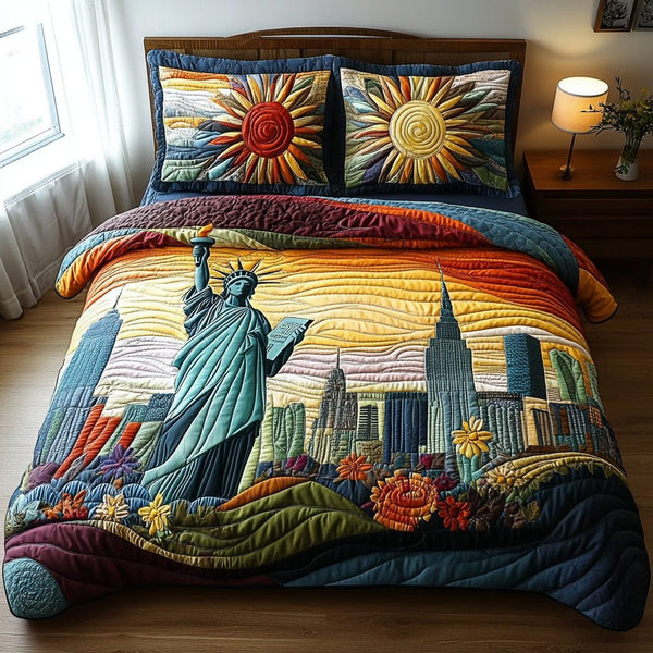 Eternal Statue of Liberty quilted 3-piece bedding set on a made bed in a warmly lit bedroom