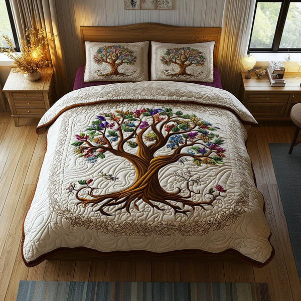Eternal Tree quilted 3-piece bedding set on a made bed with two matching pillow shams