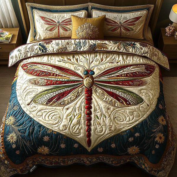 Ethereal Dragonfly quilted 3-piece bedding set on a made bed with two matching pillow shams