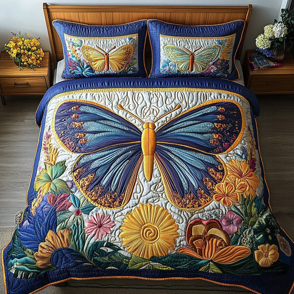 Ethereal Flight quilted 3-piece bedding set on a made bed with two matching pillow shams