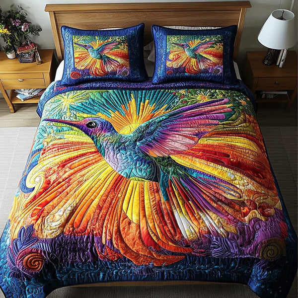 Ethereal Flight quilted 3-piece bedding set on a made bed with two matching pillow shams