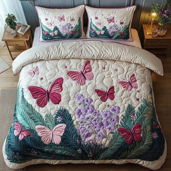 Ethereal Wings quilted 3-piece bedding set on a made bed with two matching pillow shams