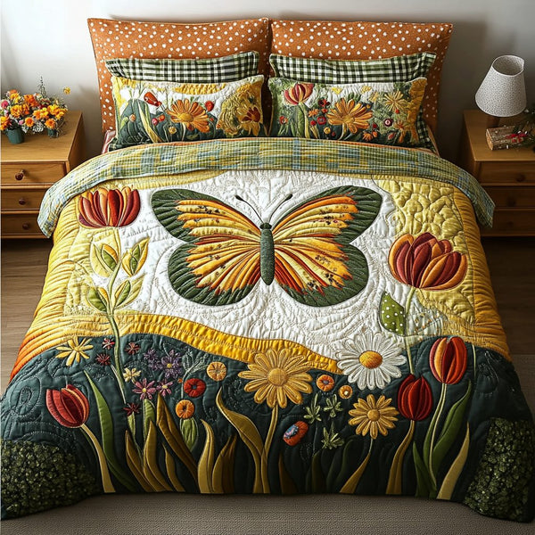 Ethereal Wings quilted 3-piece bedding set on a made bed with two matching pillow shams