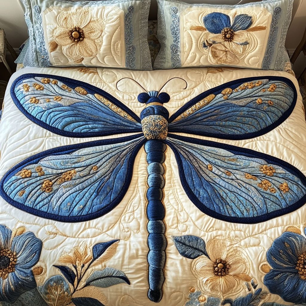Ethereal Wings quilted 3-piece bedding set on a made bed with two matching pillow shams
