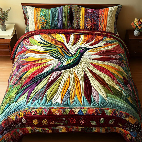 Ethereal Wings quilted 3-piece bedding set on a made bed with two matching pillow shams
