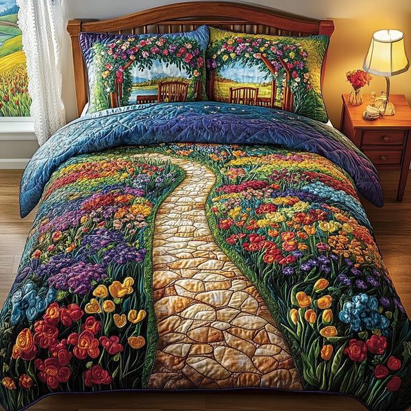 Evening Pathway quilted 3-piece bedding set on a made bed with two matching pillow shams