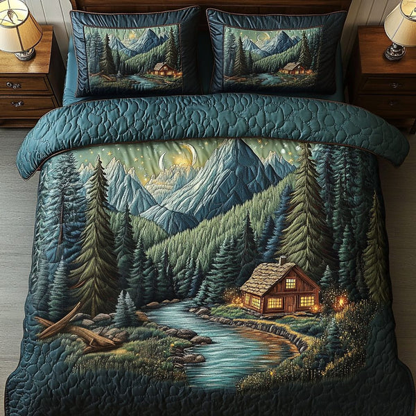 Evergreen Bliss quilted 3-piece bedding set on a made bed with two matching pillow shams
