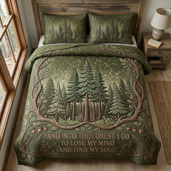 Evergreen Escape quilted 3-piece bedding set on a made bed with two matching pillow shams