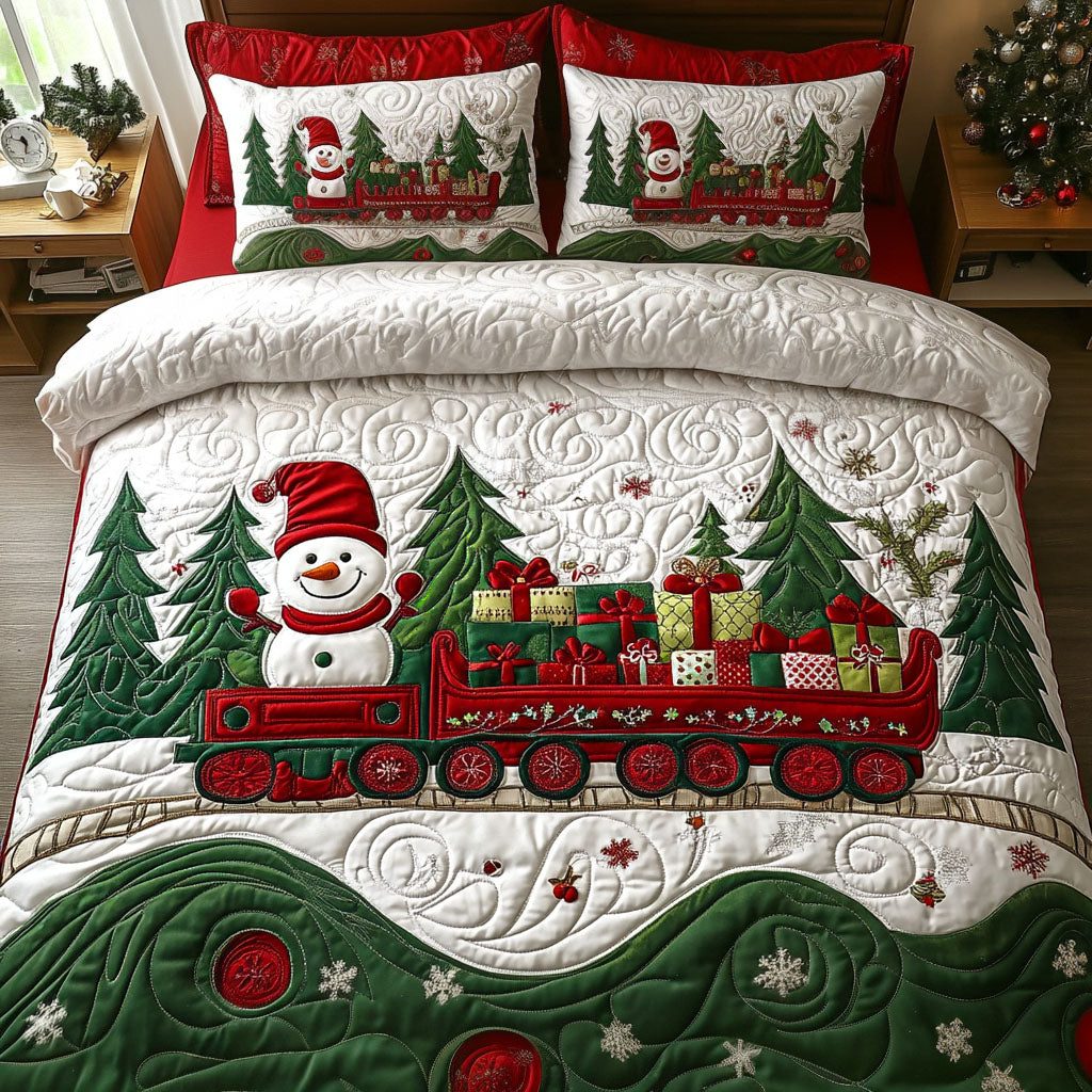 Evergreen Express quilted 3-piece bedding set on a made bed with two matching pillow shams