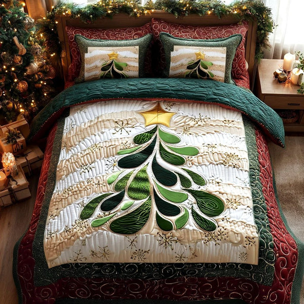 Evergreen Grace quilted 3-piece bedding set on a made bed with two matching pillow shams