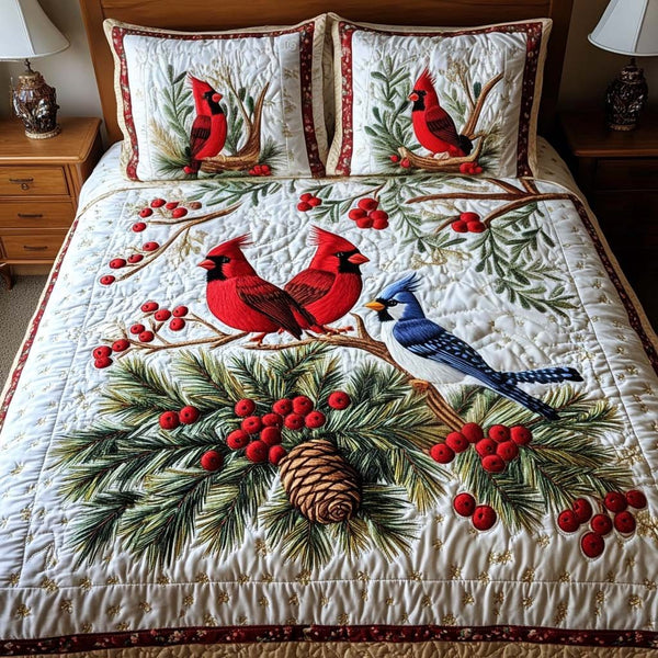 Evergreen Pair quilted 3-piece bedding set on a made bed with two matching pillow shams