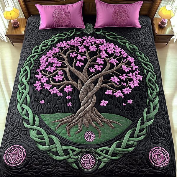 Everlasting Life quilted 3-piece bedding set on a made bed with two matching pillow shams