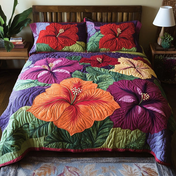 Exotic Blossom quilted 3-piece bedding set on a made bed with two matching pillow shams