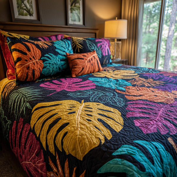 Exotic Leaves quilted 3-piece bedding set on a made bed with two matching pillow shams
