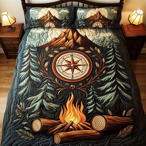 Explorers Rest quilted 3-piece bedding set on a made bed with two matching pillow shams