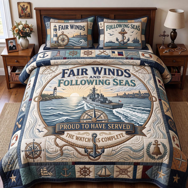Fair Winds quilted 3-piece bedding set on a made bed with two matching pillow shams