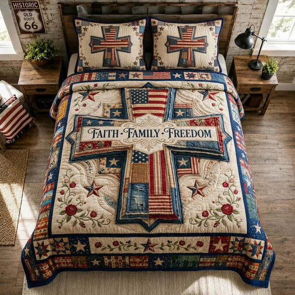 Faith Family Freedom quilted 3-piece bedding set on a made bed in a warmly lit bedroom