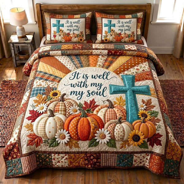 Faithful Autumn quilted 3-piece bedding set on a made bed in a softly lit bedroom
