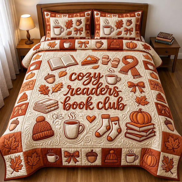 Fall Book Lover quilted 3-piece bedding set on a made bed with two matching pillow shams