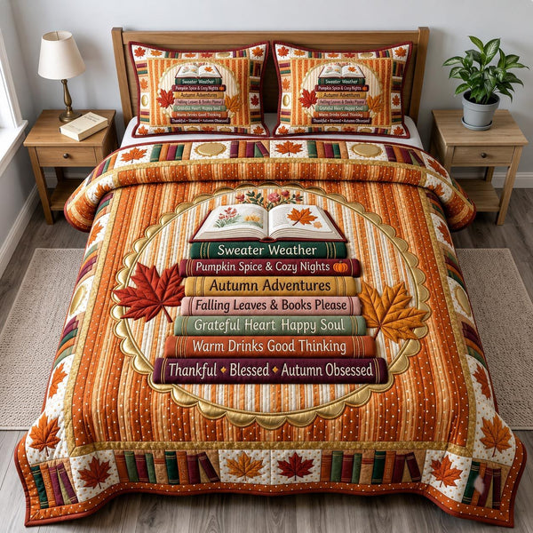Fall Book Lover quilted 3-piece bedding set on a made bed with two matching pillow shams