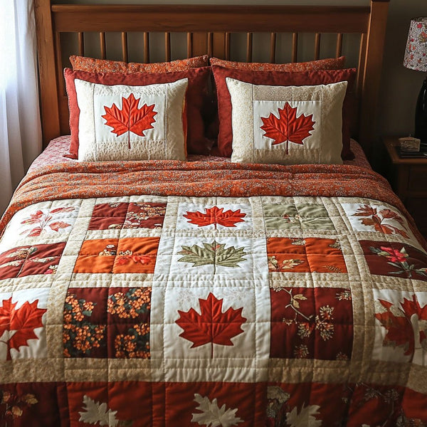 Fall Foliage Bliss quilted 3-piece bedding set on a made bed with two matching pillow shams