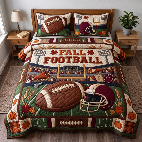 Fall Football quilted 3-piece bedding set on a made bed with two matching pillow shams